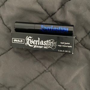 moderately cooltoned medium-dark blue with a sparkle finish permanent lipstick